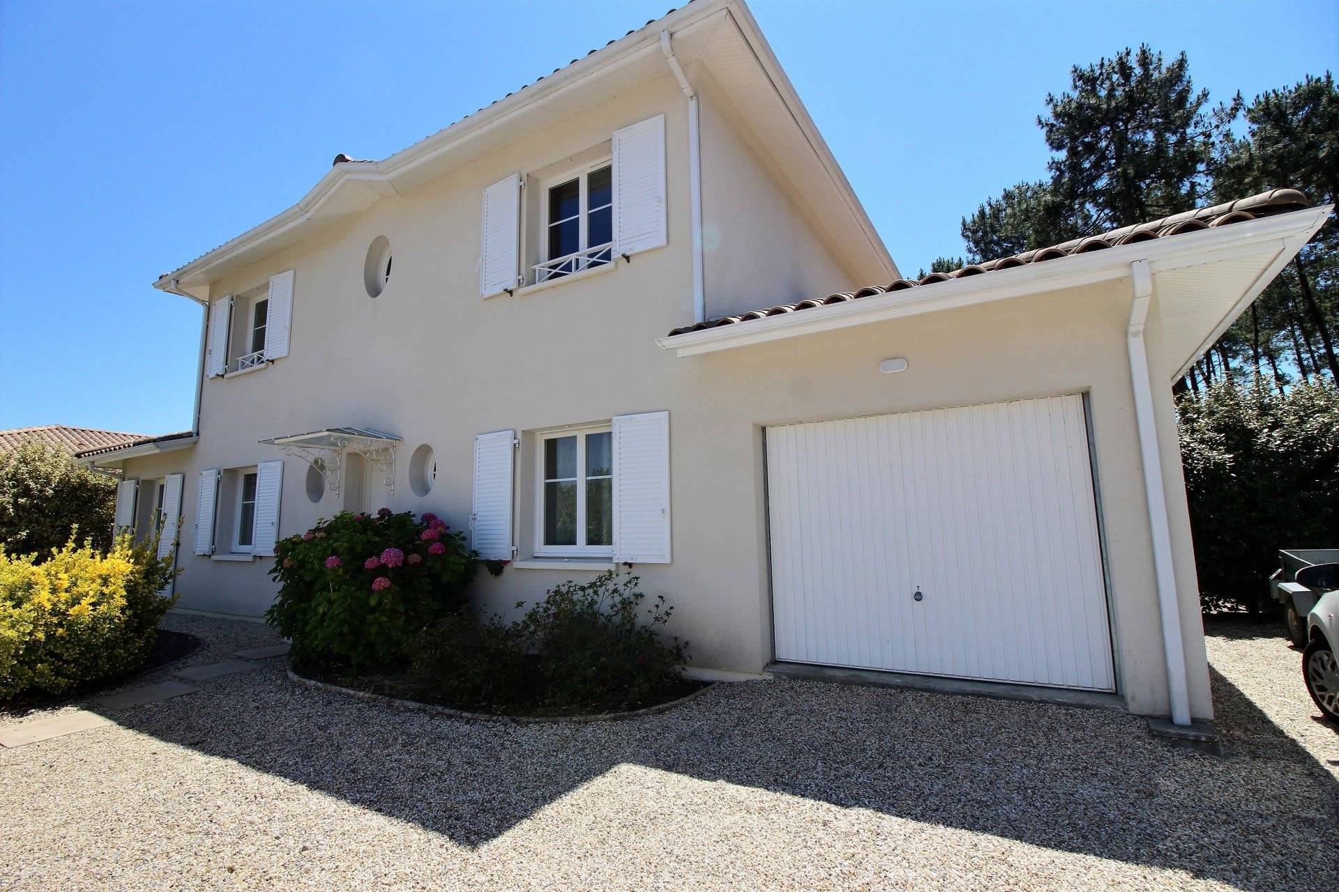 Recherche maison avec garage et 5 chambres