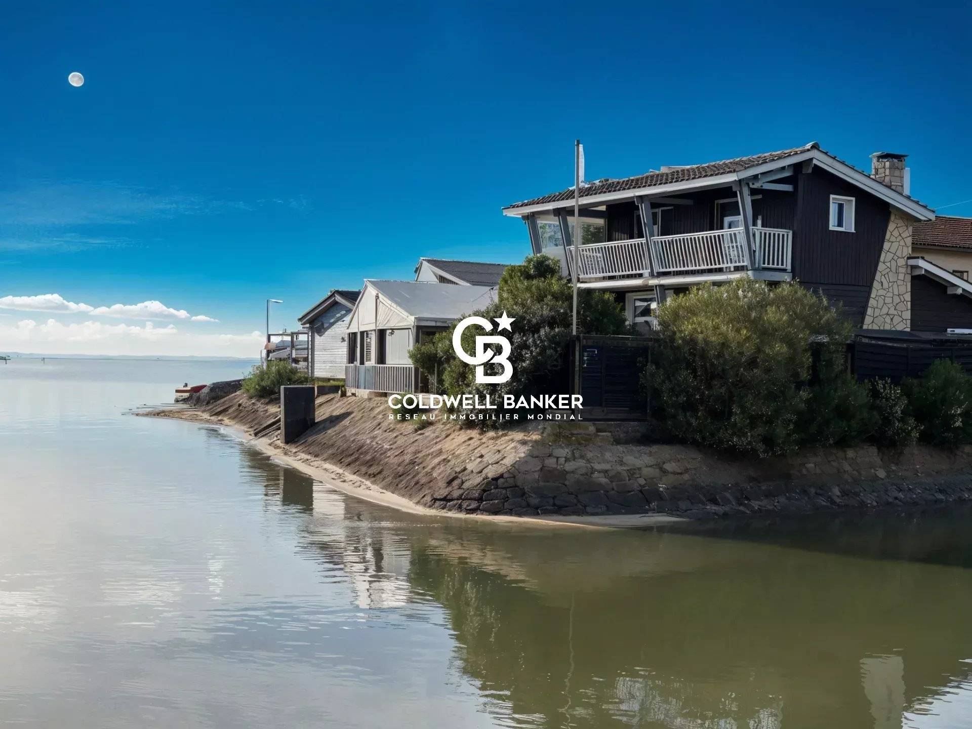 Maison à vendre à Taussat – villa en première ligne avec vue bassin, dépendance, piscine et terrasse