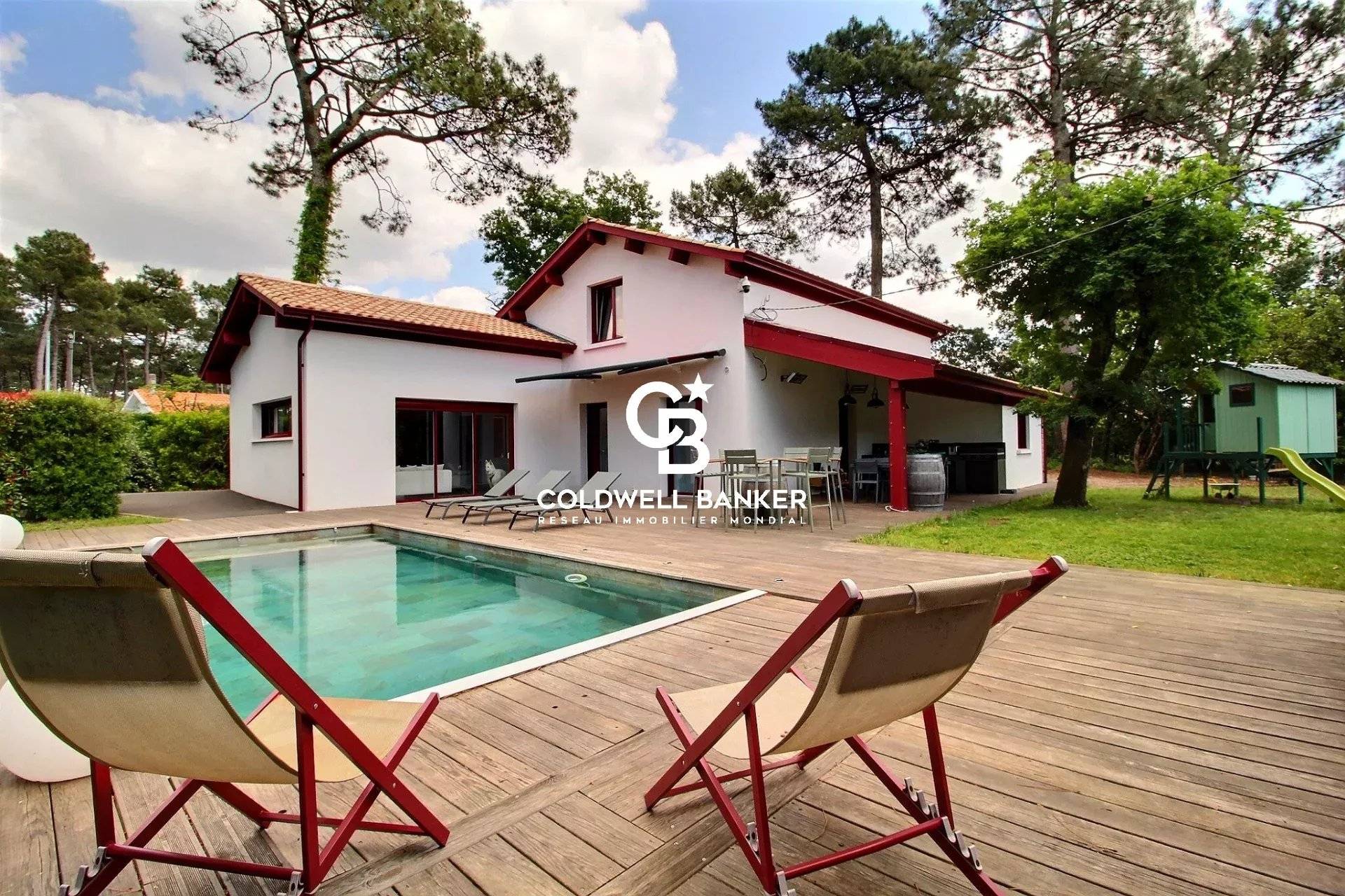 Maison à vendre à Lanton (Cassy) – propriété d’exception avec piscine, séjour cathédrale et 5 chambres sur 1500 m²