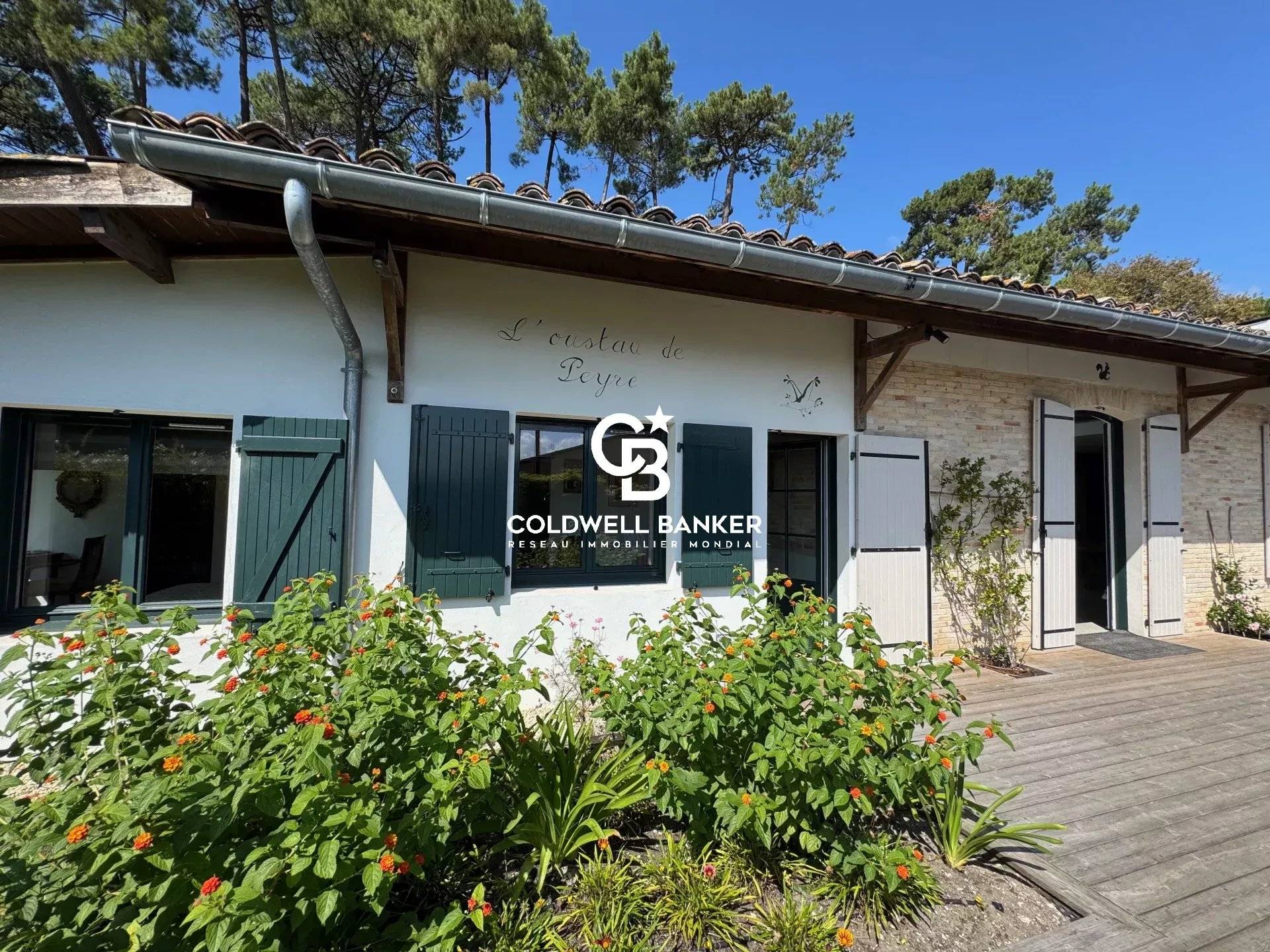 Maison à vendre au Cap Ferret – rénovée avec aperçu mer, spa et jardin