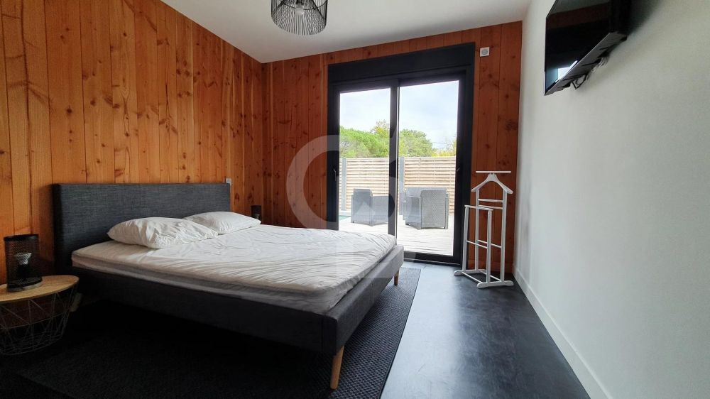 Recherche villa en bois esprit bassin avec piscine ARÈS