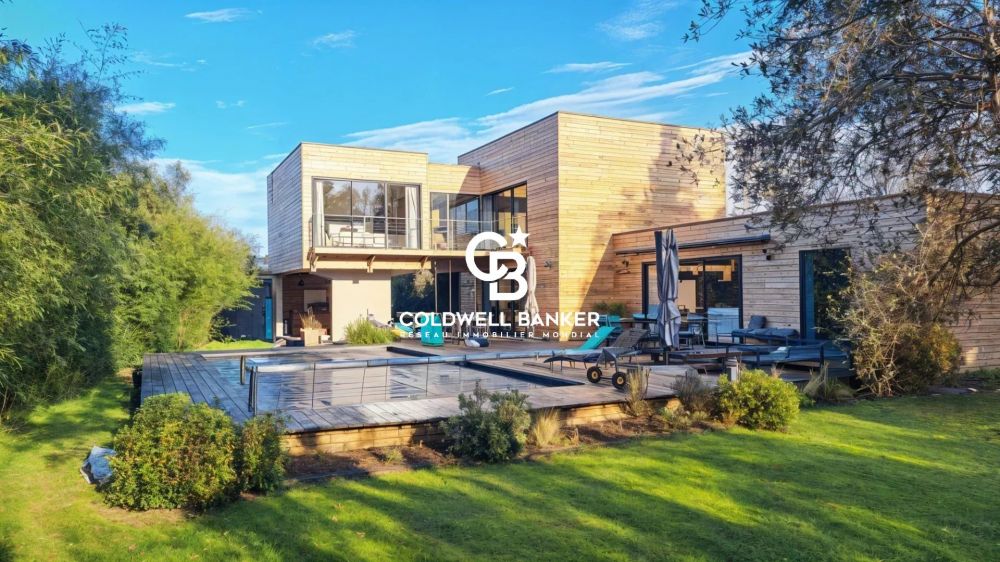 Maison à vendre Lège-Cap-Ferret - villa d’architecte avec piscine chauffée sur grand terrain arboré