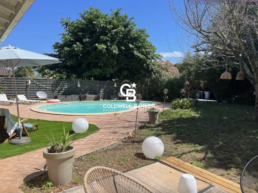 Maison à vendre à La Teste-de-Buch – villa familiale avec 5 chambres, piscine et grand garage au calme