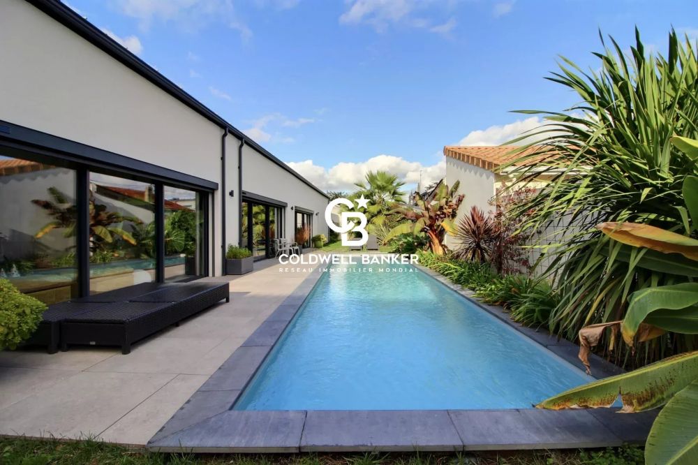 Maison à vendre à Bruges – loft de 320 m² avec jardin, piscine et appartement indépendant aux portes du Bouscat