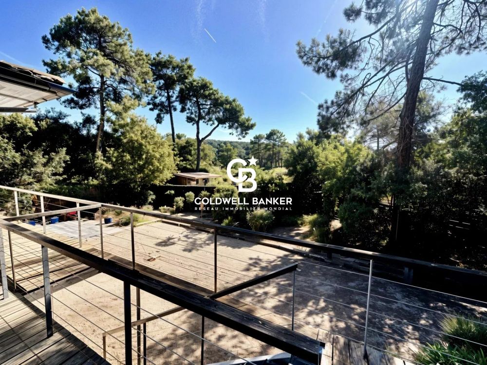 Maison à vendre à Cap Ferret – maison rénovée 7 chambres avec piscine chauffée et grande terrasse en lisière de pinède